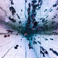 Low angle view of ceiling mirror showing people's reflection
